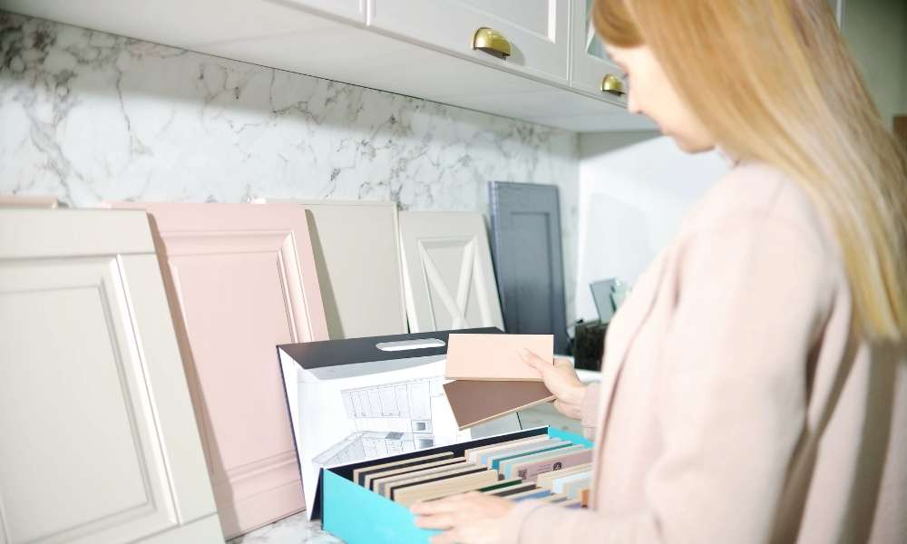 How can you know if your cabinets are made up of laminate or veneer?