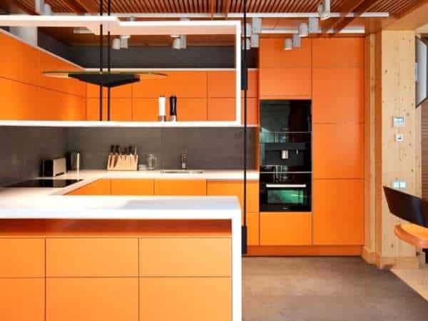 Use Track Lights in Orange Kitchens
