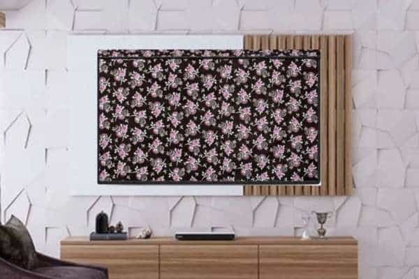 Replace your TV with a fabric cover to conceal it