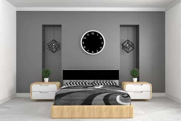 Try A Bedroom With A Black Headboard, Grey Walls And Warm Lighting
