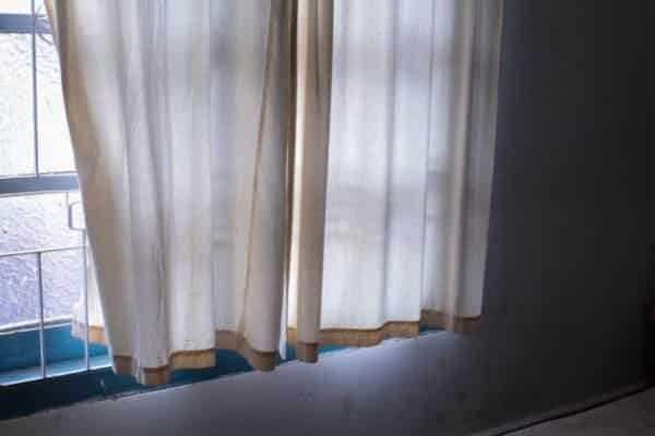 How Long Should Curtains Hang Below the Window Sill?