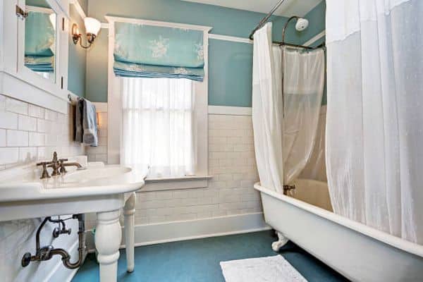 Use Weights or Magnets To Prevent Water From Leaking Outside A Shower Curtain