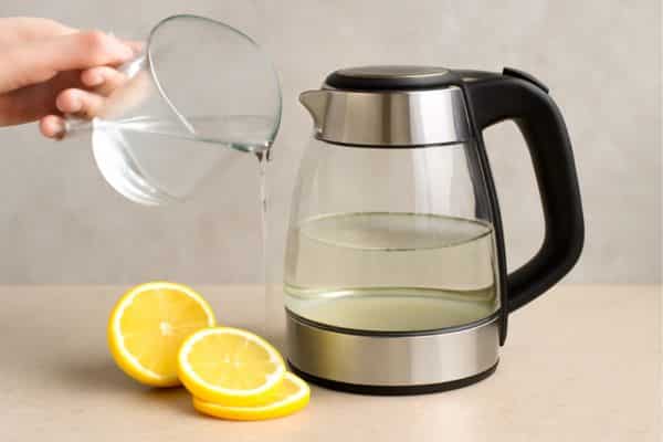 Add Your Cleaning Solution To Clean Water Kettle