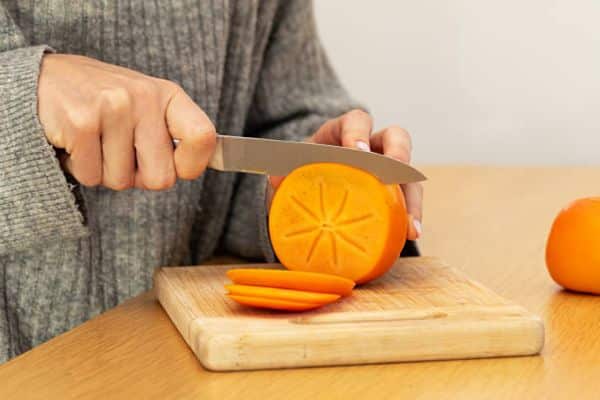 Step 1: Slice Evenly to Dehydrate Persimmons in Air Fryer